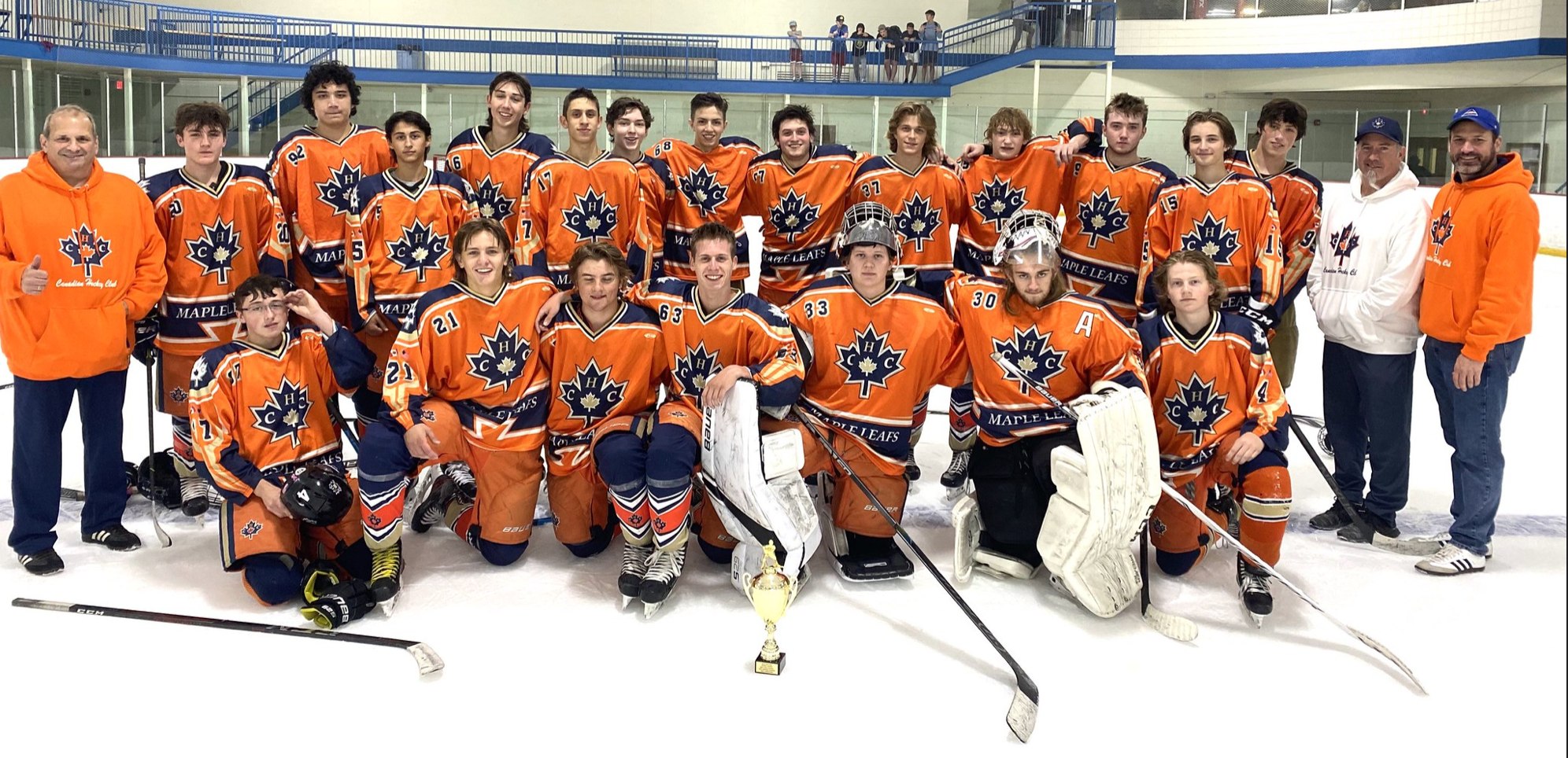 CHC team photo celebrating their 2021 Tier 1 NESC Orange Bronze Division championship