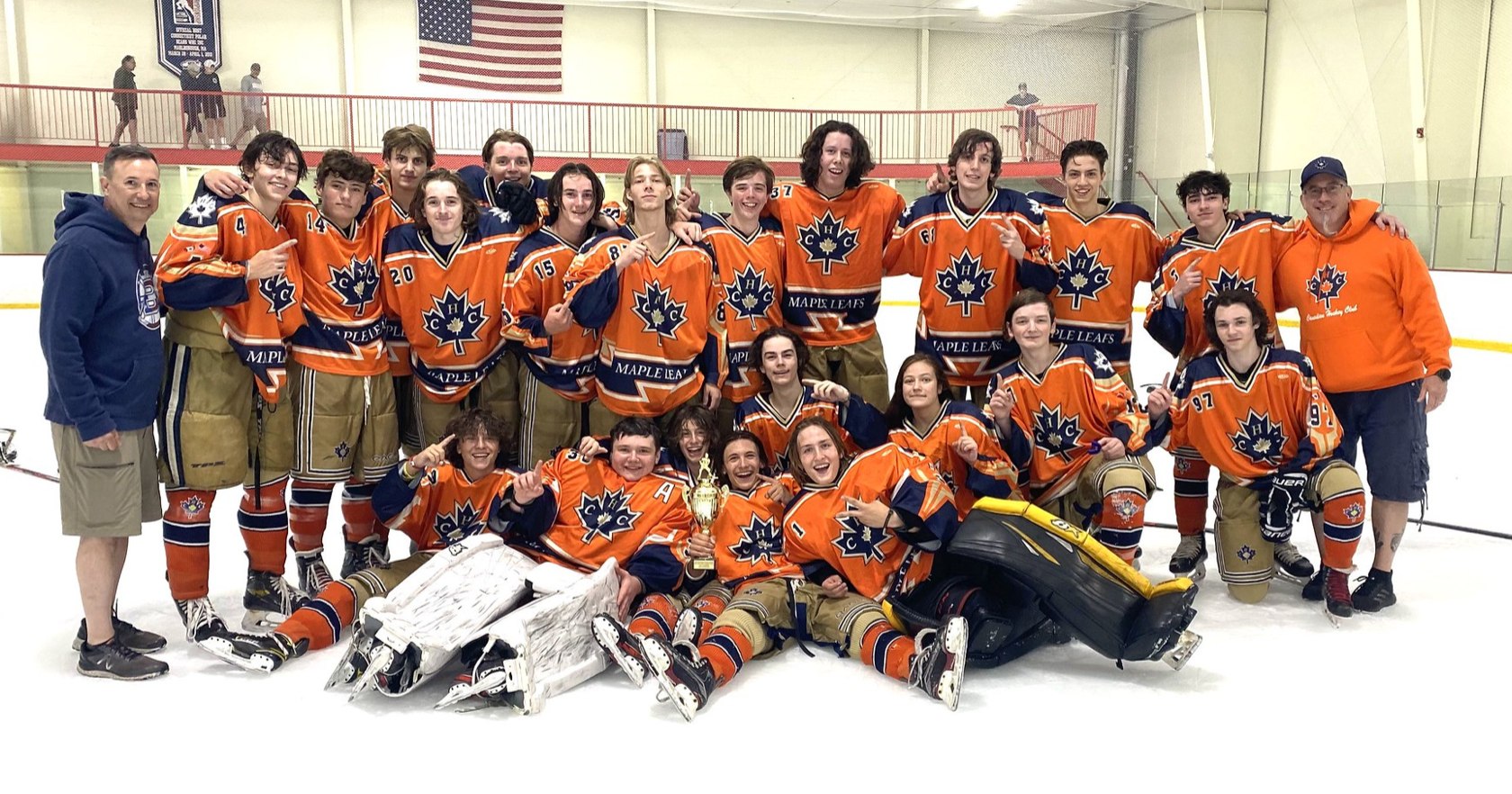 CHC team photo celebrating their 2022 Tier 3 NESC Orange championship