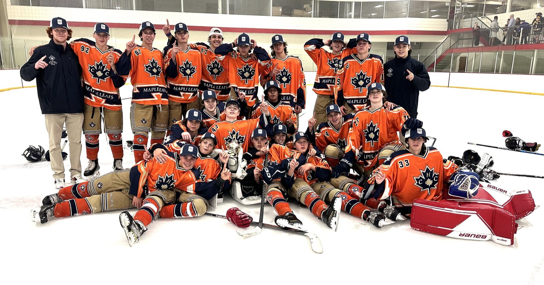 CHC team photo celebrating their 2024 Tier 3 NESC Orange championship