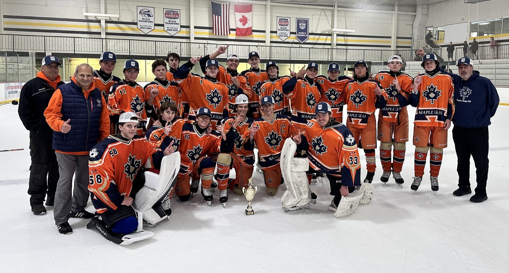 CHC team photo celebrating their 2025 Tier 3 NESC Orange championship